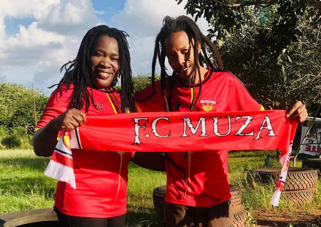 The Zulu family showcases their Muza FC regalia